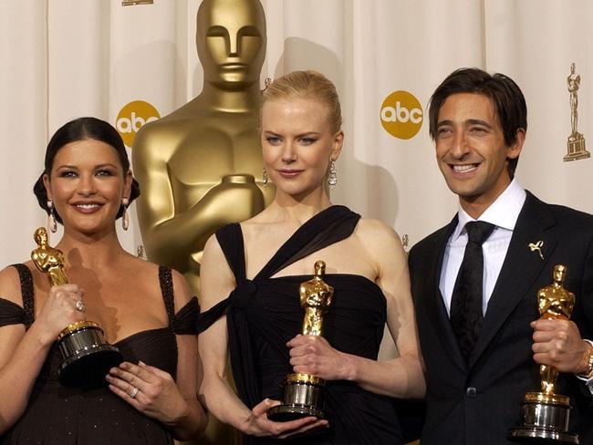 Oscar winners Catherine Zeta-Jones, Nicole Kidman and Adrien Brody, pictured with their awards in 2003. Picture: AP