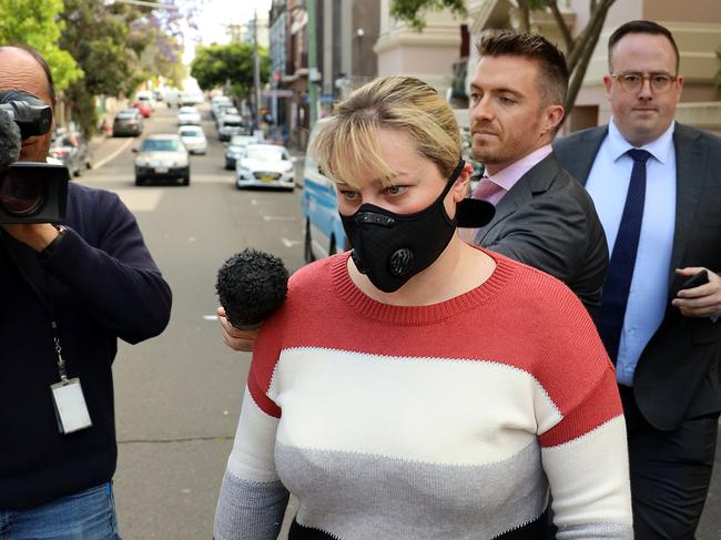 Morris left with her partner in a cab. Picture: NCA NewsWire/Nicholas Eagar