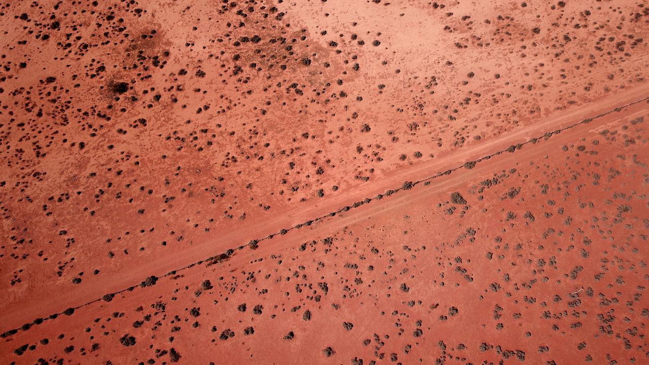 Red dirt next to an irrigated area of land next to Lake Pamamaroo near Menindee. Picture: Toby Zerna