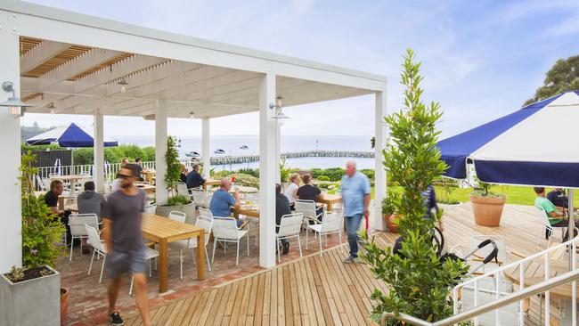 The expansive umbrella’d deck area at the new-look Portsea Hotel.