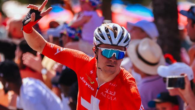 Switzerland's Mauro Schmid of Team Jayco Alula crosses the line to win the 2025 Cadel Evans Great Ocean Men's Elite Road Race in Geelong on February 2, 2025. (Photo by CHRIS PUTNAM / AFP) / -- IMAGE RESTRICTED TO EDITORIAL USE - STRICTLY NO COMMERCIAL USE --