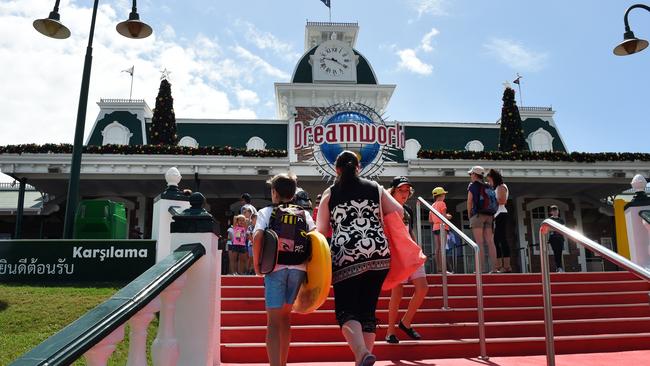 Visitors arrive at Dreamworld on the Gold Coast, Saturday, Dec. 10, 2016. The amusement park has been closed for the past six weeks while authorities investigated the death of four people on the Thunder River Rapids ride on October 25. Picture: AAP/Dan Peled.