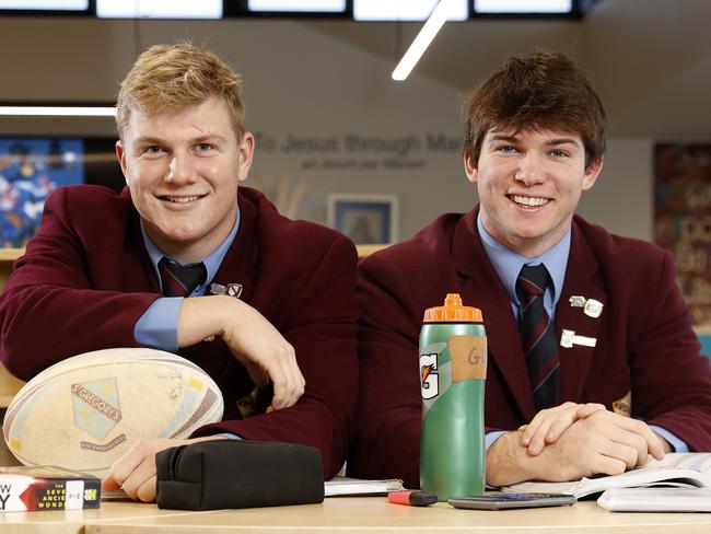 St Gregg’s students Charlie Guymer (left) with teammate Tom Fletcher are aspiring academics as well as dominant schoolboy footy stars. Picture: Jonathan Ng