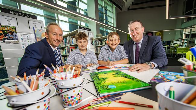 Left to right: Moreton Bay Boys’ College teacher Richard Curtis with Year 6 students Rory Bermingham and Jackson White, and Principal Andrew Holmes. Photo: Nigel Hallett.