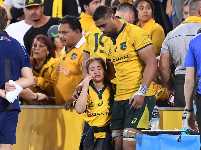 Wallabies player Lukhan Tui with a family member after the incident, Picture: AAP