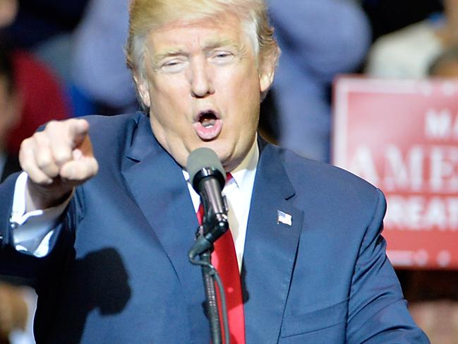 FAYETTEVILLE, NC - DECEMBER 06: President-elect Donald Trump addresses an audience at Crown Coliseum on December 6, 2016 in Fayetteville, North Carolina. Trump took time off from selecting the cabinet for his incoming administration to celebrate his victory in the general election. Sara D. Davis/Getty Images/AFP == FOR NEWSPAPERS, INTERNET, TELCOS & TELEVISION USE ONLY ==