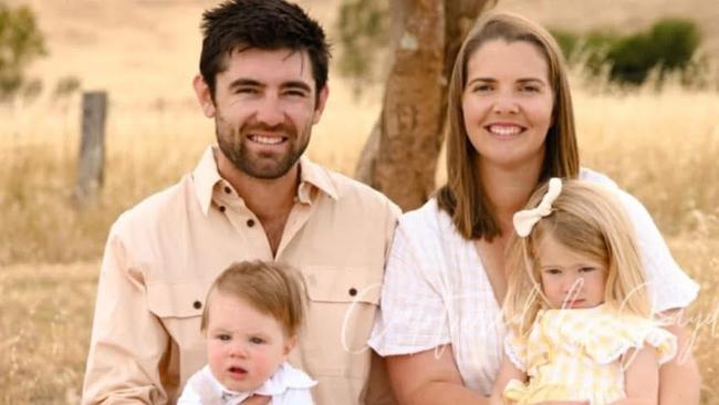 Cameron Bond, 29, who has been diagnosed with stage 3c bowel cancer, with his family, partner of five years Jessica Theobald and children two-year-old Eliza and nine-month-old Clancy. Picture: Supplied