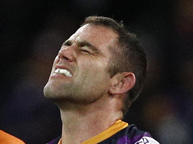 Cameron Smith of the Storm (centre) receives medical attention during the Round 23 NRL match between the Melbourne Storm and the Parramatta Eels at AAMI Park in Melbourne, Friday, August 17, 2018. (AAP Image/Daniel Pockett) NO ARCHIVING, EDITORIAL USE ONLY