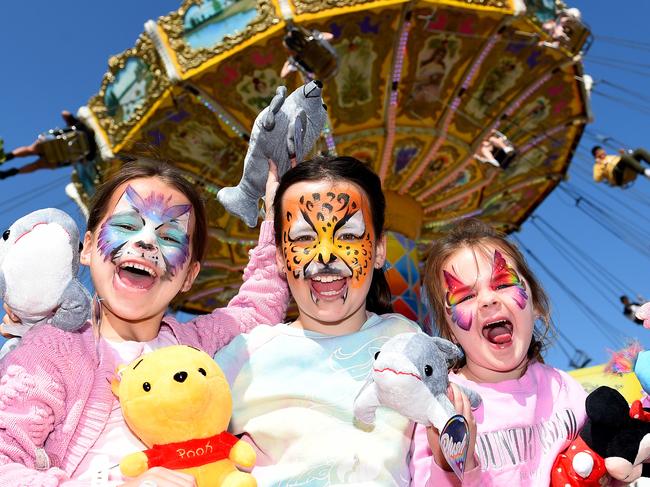 (L-R) Indy Tandy (6), Madeline Tandy (8) and Harper Evans (4) at the Melbourne Royal Show. Picture: Josie Hayden