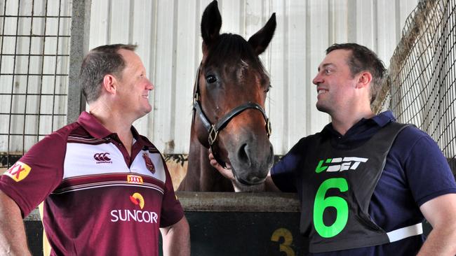 Trainer Tony Gollan (right) introduces Queensland Maroons coach Kevin Walters to one of his stable stars, Tiyatrolani. Picture: Noel Pascoe