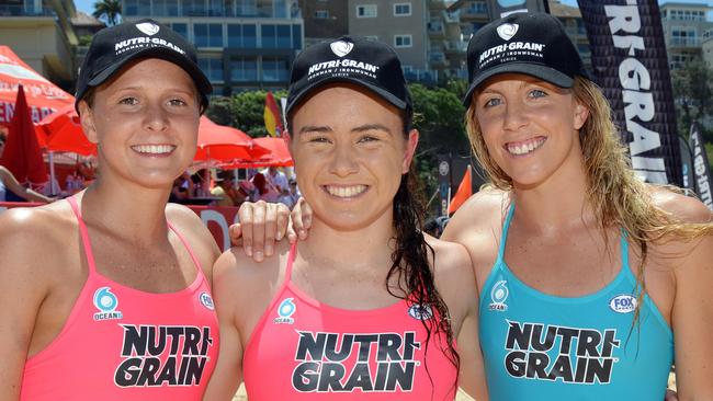 Umina's Jemma Smith (c) with Lizzie Welborn (North Bondi) and Georgia Miller (Newport).  Pic: Troy Snook