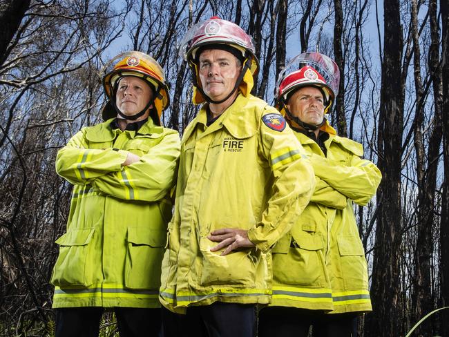 Noosa Heads Station Officer Rob Frey, Maroochydore Area Commander Cameron Herbert and Inspector Bernie Massingham back at the scene where an out of control bushfire was stopped, saving thousands of homes at Peregian Beach. Photo Lachie Millard