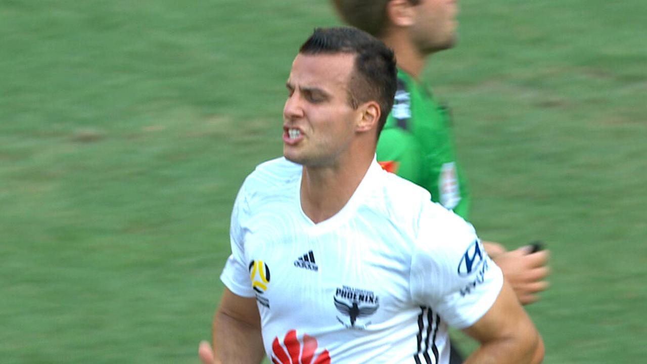 Steven Taylor reacts after his miss