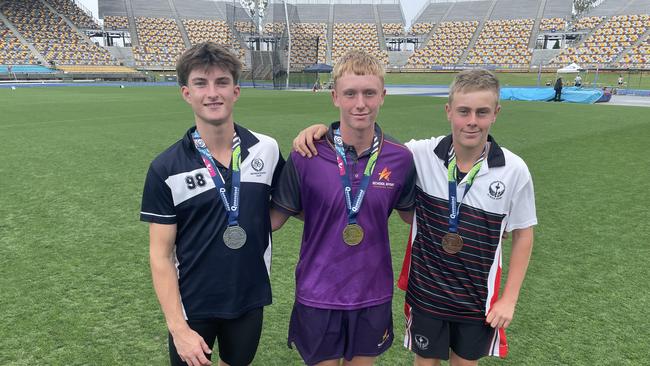 Redcliffe SHS's Nate Bligh, middle, with his gold medal. On either side of him were Jake Hambrook-Smith, left, and Cooper Laycock.