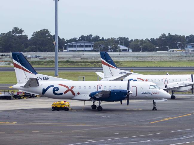 SYDNEY, AUSTRALIA - NewsWire Photos FEBRUARY 06, 2021: Rex planes are seen parked on the tarmac at Sydney Domestic Airport.  Picture: NCA NewsWire / Jenny Evans