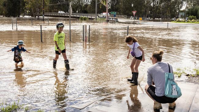 Rochester locals view the floods after the rains. Picture: Getty Images