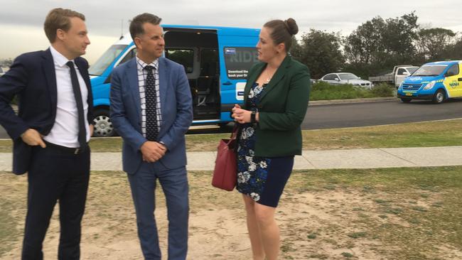 Manly MP James Griffin (left), with NSW Transport Minister Andrew Constance and Yvette Mihelic, general manager for on demand transport at Transdev in 2018, at Freshwater to announce the expansion of the RIDEplus on demand bus transport service on the northern beaches.