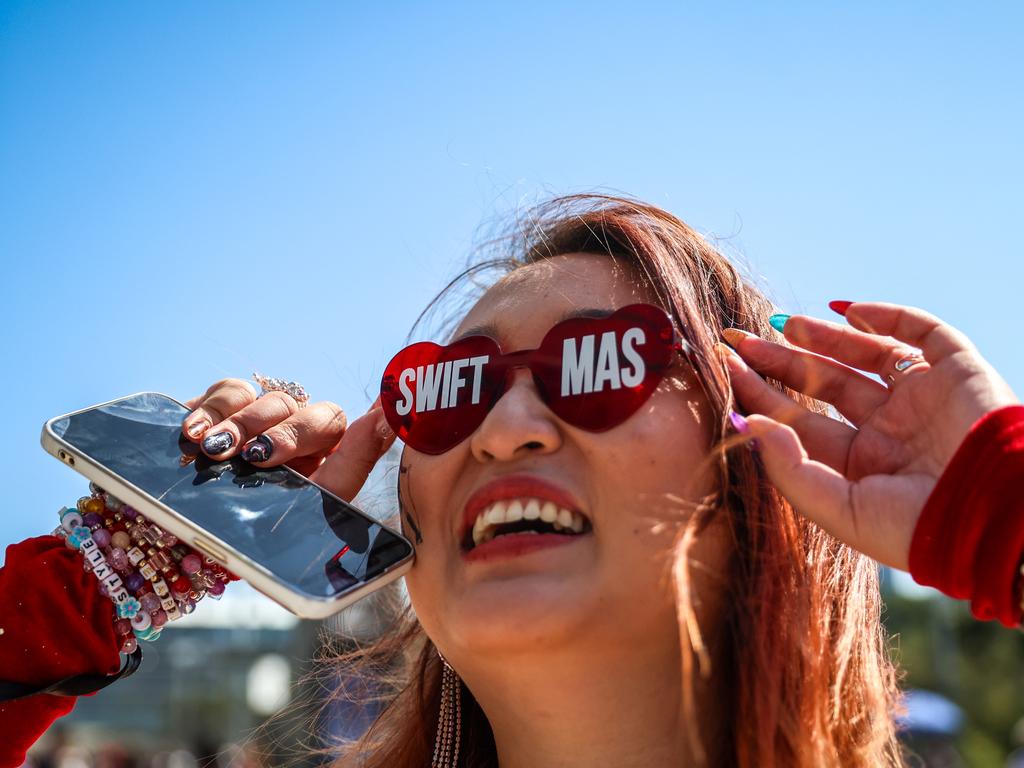 A Swiftie captured wearing glasses that read ‘Swifmas’ before Taylor Swift’s ‘The Eras Tour’ concert at Melbourne Cricket Ground on February 16, 2024. Taylor Swift’s global Eras Tour was a massive cultural and economic phenomenon, breaking records and generating billions in revenue. With its huge scale and devoted fanbase, the tour cemented Swift as one of the most influential pop stars of the 21st century. Picture: Getty