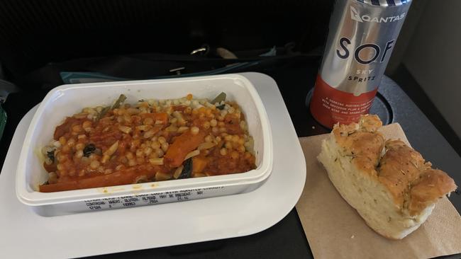 Previously Qantas economy passengers on international flights could expect a meal and bread, plus a beverage. Picture: Elyse Popplewell