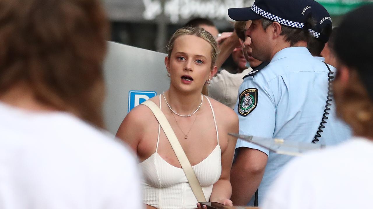 Schoolies wait in line to get in to the Beach Hotel in Byron Bay. Picture: Jason O'Brien