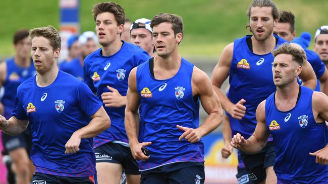 Josh Dunkley, centre, was the fourth-ranked player in SuperCoach last season. Picture: James Ross/AAP