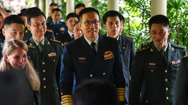 China's Defence Minister Dong Jun walks out of his meeting with the US. Picture: AFP