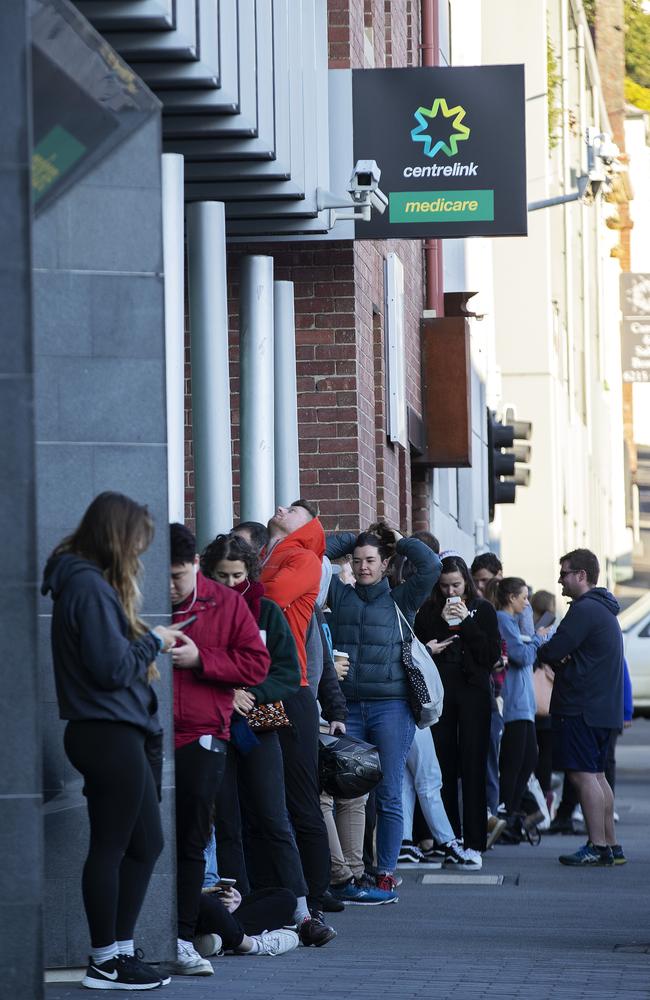 People line up outside the Centrelink office at Hobart, Tasmania. Picture: Chris Kidd