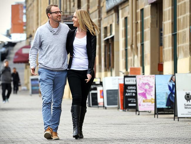 Nathan Street and Emily Bryan, who have sold their property in Burnie and are going overseas, visit Salamanca. Picture: SAM ROSEWARNE                        TASMANIA’S North-West is finally enjoying a taste of better real estate times with house sales rebounding dramatically and some properties spending less than a week on the market.                     After several years of being the state’s poor property cousin, the North-West saw house sales spike 26.5 per cent in the June quarter and 24.4 per cent on the year.Real Estate Institute of Tasmania president Tony Collidge said agents were reporting an increase in buyer confidence.“Fears of job losses saw the market drop but agents are saying that confidence has returned over the last six months with a feeling that the worst is over. People are deciding now is the time to buy in,” Mr Collidge said.Burnie house owner Nathan Street is one investor to be rewarded for his trust in bricks and mortar.Mr Street, 27, and partner Emily Bryan are off to the UK to live and wanted to sell the property quickly.But they were amazed when it was snapped up within five days and for a good price.“We put the property on the market in May and it was gone in five days,” Mr Street said.“We had been told that reasonably priced houses in good areas were moving but we were surprised at just how fast things happened.”Mr Street bought the house in 2013 and doubled his investment in 18 months.“I did the place up but was always a bit worried I would not make my money back,” he said.“We don’t have to sweat now and can head off without the worry of having a house on the market.”                        – HELEN KEMPTON 