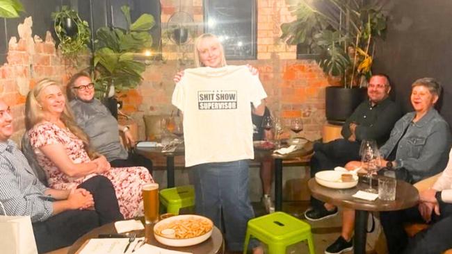 Redland City Council staff at a private function for a departing staff member who received a T-shirt with the slogan ‘Sh*t Show Supervisor’. Pictures: Contributed