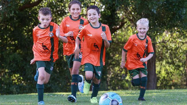 Hornsby Heights players Noah Dominish, 9, Matilda Brookes, 8, Cooper Steptoe, 8, and Zac Dominish, 7, train in Asquith. Picture: Justin Lloyd