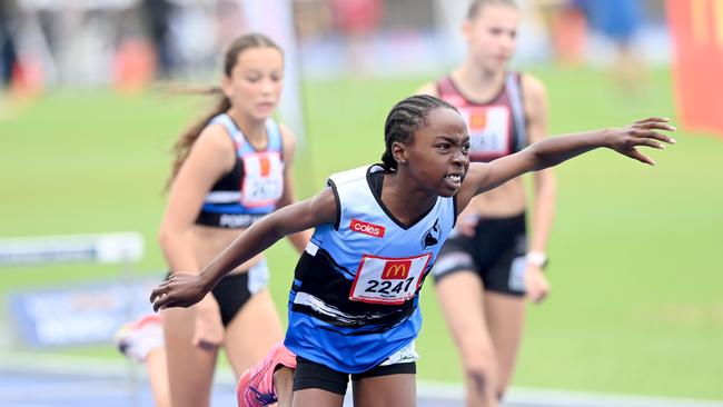 Rhema Adelaja from Port Hacking in the U12 hurdles at the Athletics centre.