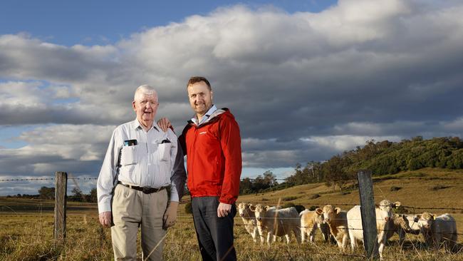 Phil and his son Ed O'Grady on their land in Cobbitty where they had planned to build 800 homes. Picture: Jonathan Ng