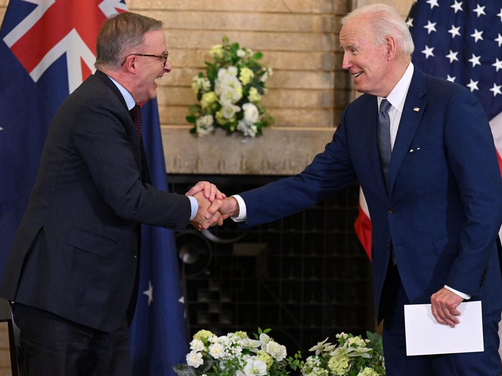 Joe Biden shakes hands with Anthony Albanese earlier this year. Picture: Saul Loeb (AFP)