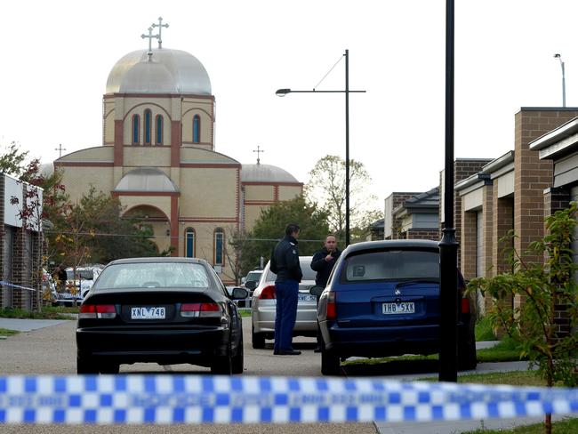 Police forensic examine the scene of the shooting from Hemstal Lane, where the Church Rd property has rear access. Picture: Nicole Garmston