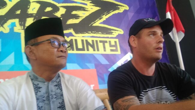 Bali Nine member Matthew Norman with Kerobokan prison governor Tonny Nainggolan