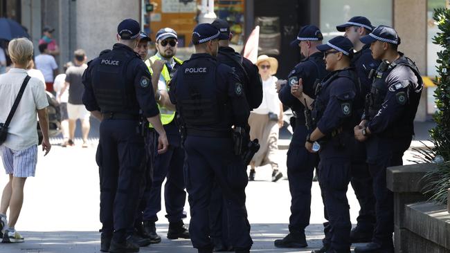 Police officers prepare for the protest to start in Hyde Park in the Sydney CBD. Picture: Jonathan Ng