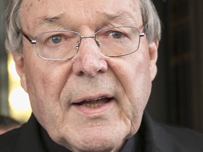 Cardinal Pell reads a statement to the media after a private meeting with the clergy victims at Hotel Quirinale in Rome. Pic Ella Pellegrini