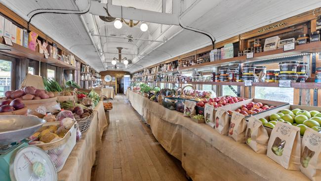 Local and fresh-grown produce for sale on the ex-Red Rattler carriage converted into a shop.