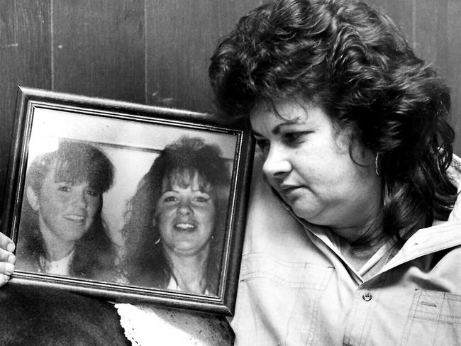 Ann Gannan, holding photo of 2 daughters Lisa and Kerryann who, with their father Tom, were killed in 1992 Central Coast massacre.