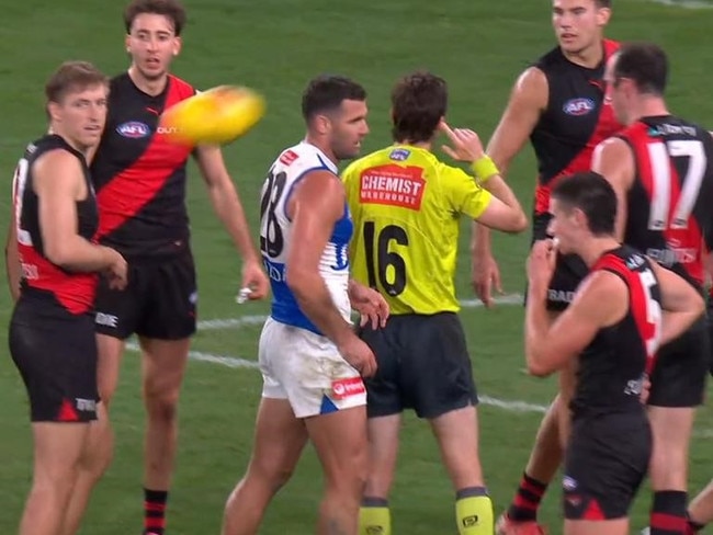 But the umpire changed his mind after getting word through his ear piece. Picture: Fox Footy