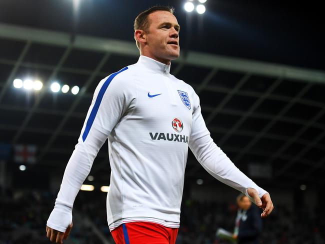 Wayne Rooney walks off the pitch.