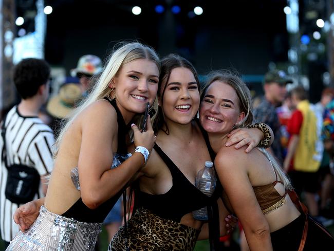 The Grass Is Greener music festival at the Cairns Showgrounds. Lexi Ford, Kasey Devine and Hayley Dek. PICTURE: STEWART MCLEAN