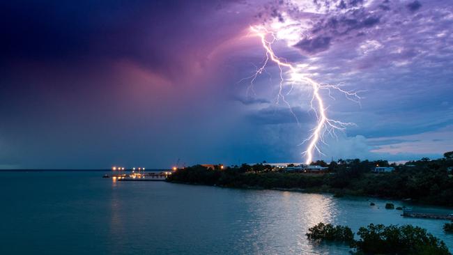 A slow moving lightning storm passes over Larrakeyah Barracks, Darwin. Picture: Che Chorley