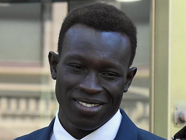 Majak Daw leaves the County Court in Melbourne. Picture: Andy Brownbill