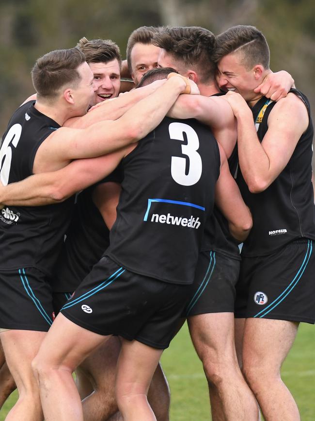 St Mary's players celebrate their NFL Division 3 premiership victory over Panton Hill. Picture: Nathan McNeill.