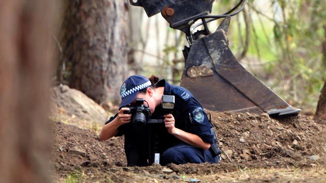 NSW Police and Rural Fire Service volunteers search an area of bush, 1km from the former home of William Tyrrells’s foster grandmother in Kendall. Picture: AAP Image/Mick Tsikas