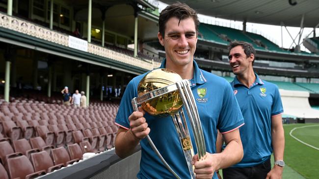 Pat Cummins poses with the Cricket World Cup 2023 Trophy. (Photo by Saeed KHAN / AFP)