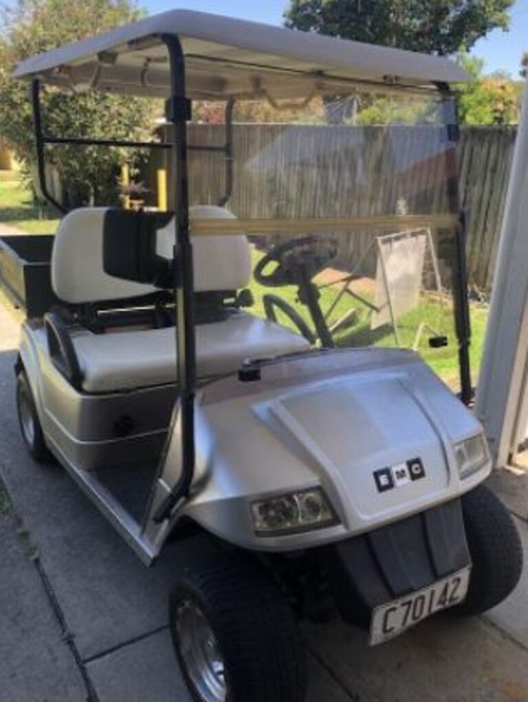 An electric golf cart with charger is selling for $2,500.