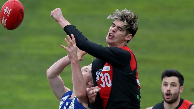 Brandon Zerk-Thatcher climbs high to spoil for Essendon’s VFL team.