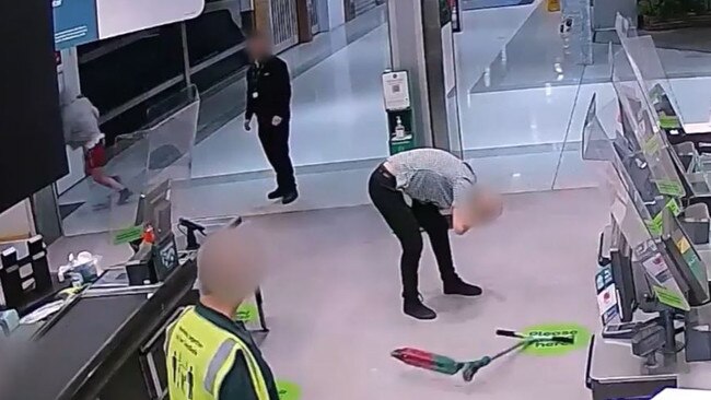 A Woolworths worker is doubled over in pain after a teenager threw a scooter at their head.